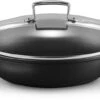 Le Creuset Hapjespan Met Deksel - Les Forgées TNS - ø 28 Cm / 3.2 Liter - Standaard Anti-aanbaklaag 1 Le Creuset Hapjespan Met Deksel - Les Forgées TNS - ø 28 Cm / 3.2 Liter - Standaard Anti-aanbaklaag -Thuiskeuken LC 20190624 ZS PS FS 51107280010502 001